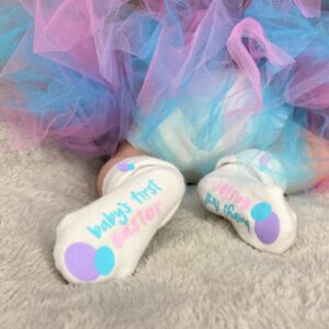Baby's First Easter socks modeled with tutu skirt colored pink, purple and teal
