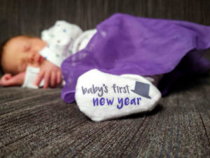 Baby Shower Gift- Baby's First New Years Socks with black top hat modeled by newborn girl with purple skirt- Baby's First Holidays