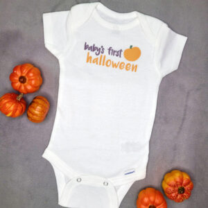 Baby's First Halloween bodysuit displayed with mini pumpkins